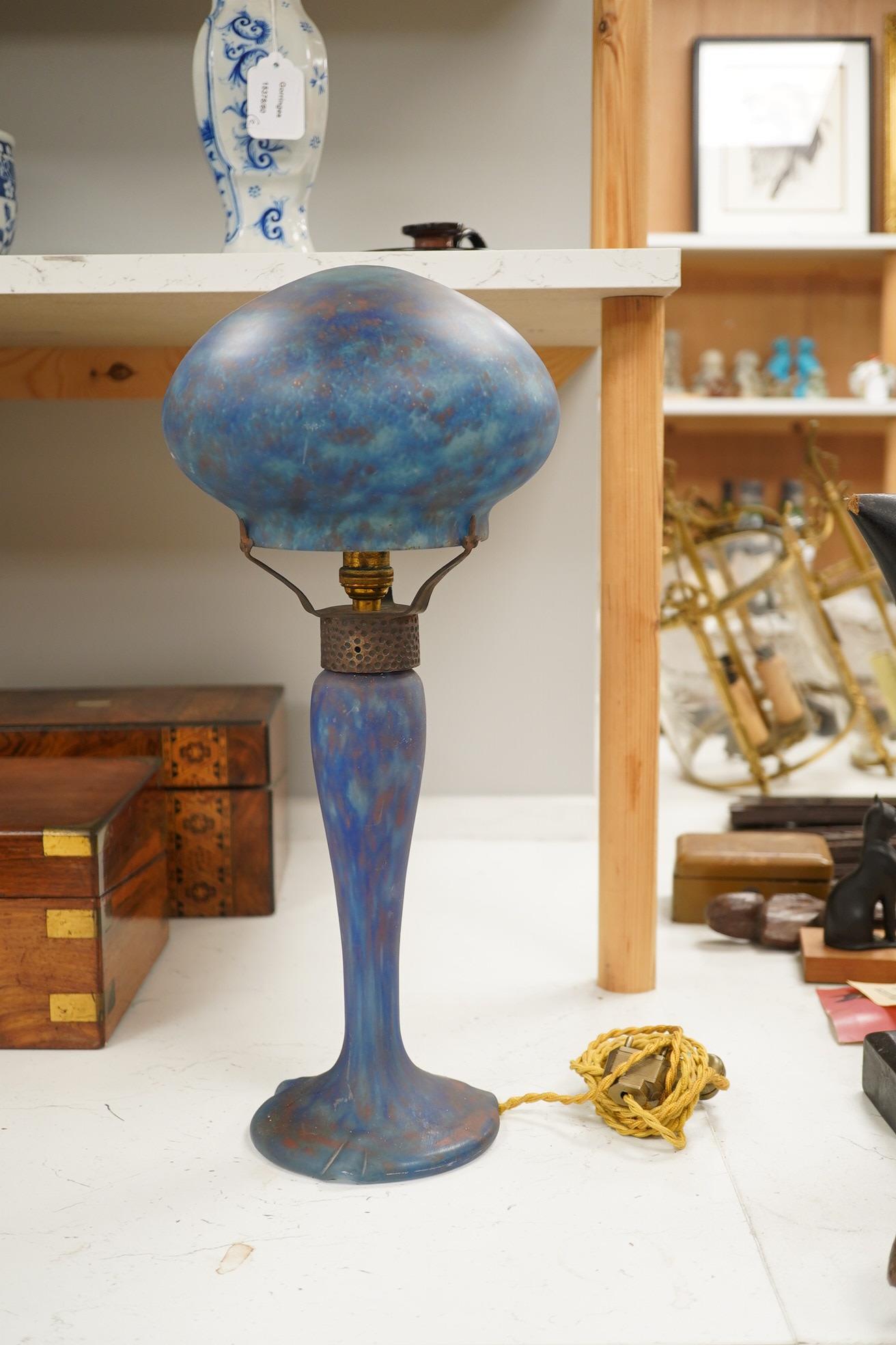 Art Nouveau, ‘Delatte’ mushroom blue glass lamp with hammered metal mount, 45cm high. Condition - good